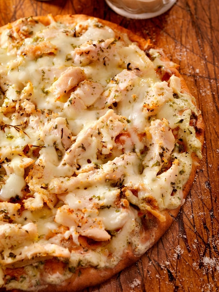 Homemade chicken alfredo pizza