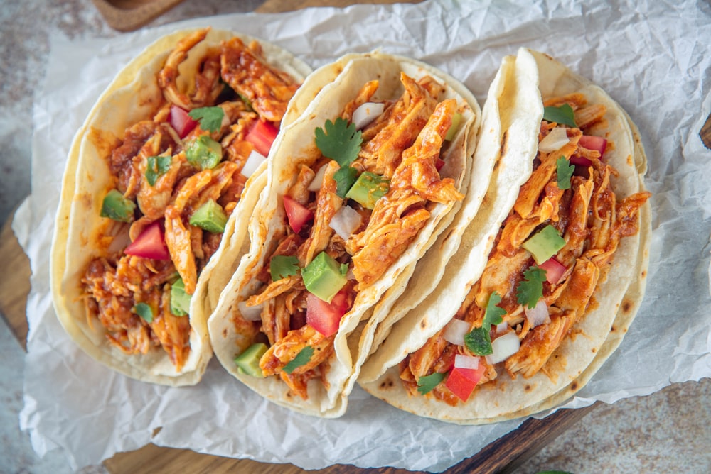 slow cooker queso chicken tacos