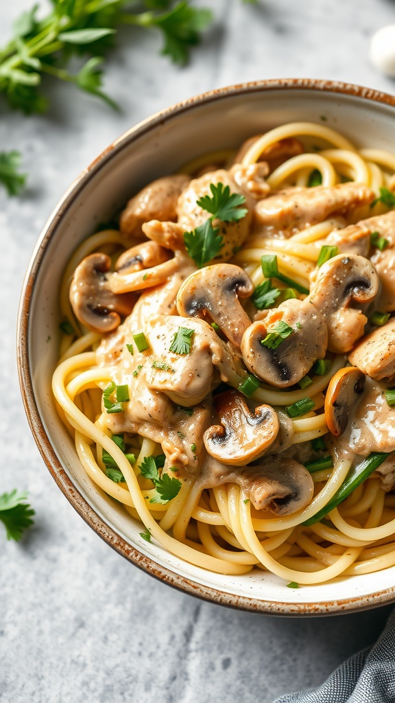 A bowl of chicken and mushroom stroganoff with pasta and garnished with parsley.